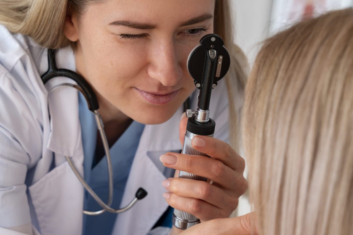 side-view-doctor-checking-patient-s-eyes